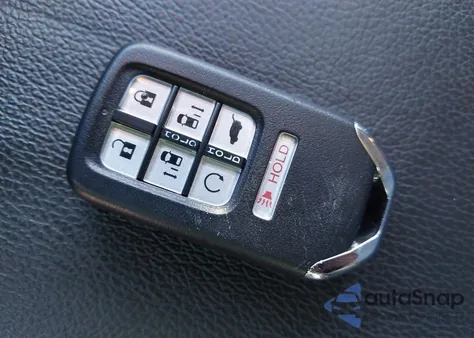 2023 Honda Odyssey Touring z USA, uszkodzony, nr VIN 5FNRL6H87PB032578